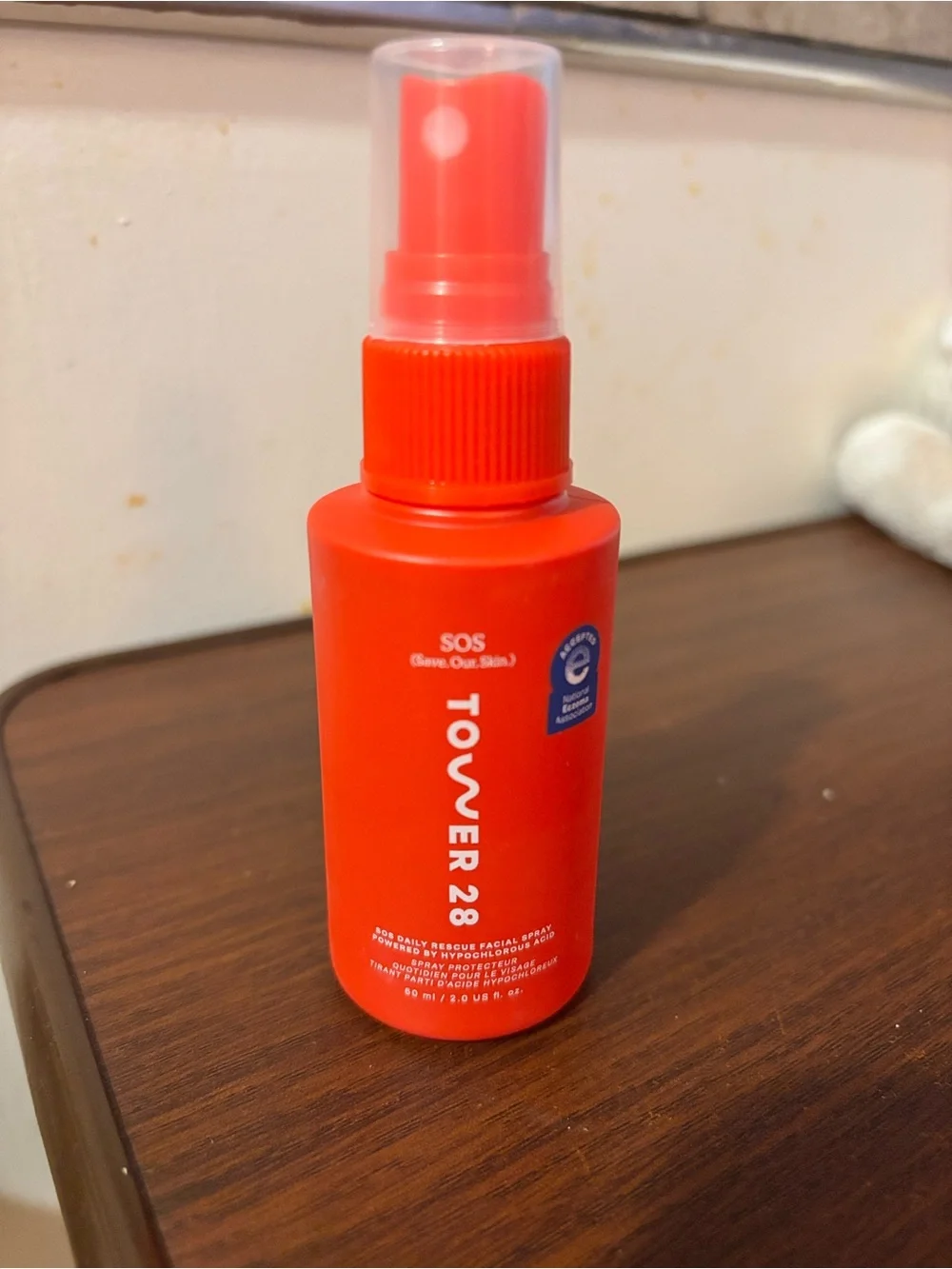 Tower 28 SOS Facial Spray in Bright Orange Bottle